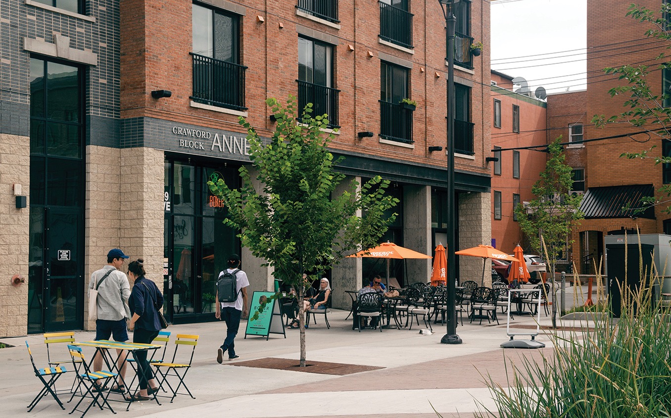 Plazas and patios located in the Strathcona Back Street project, featuring integrated landscape architecture and urban design located in Treaty 6 Territory in Strathcona, Edmonton, Alberta.